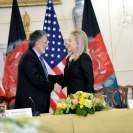 Photo: U.S. Secretary of State Hillary Rodham Clinton shakes hands with Afghan Foreign Minister Zalmai Rassoul after the U.S.-Afghanistan Bilateral Commission at the U.S. Department of State in Washington, D.C., October 3, 2012. [State Department photo/ Public Domain]