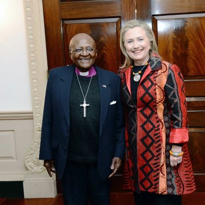 Photo: U.S. Secretary of State Hillary Rodham Clinton meets with Archbishop Desmond Tutu at the U.S. Department of State in Washington, D.C., October 10, 2012. [State Department photo/ Public Domain]