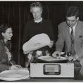 Photo: J. W. Roberts, Mrs. E. B. Haas, and Miss J. Cobb with Memovox, 1949
