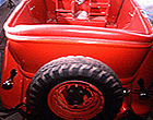 image of the Yellowstone red car