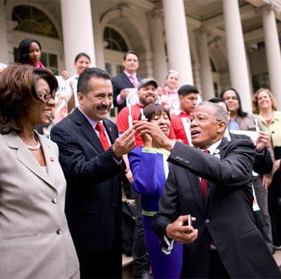 Photo: At a City Hall press conference today for National Latino AIDS Awareness Day, Council Member Robert Jackson hands an OraQuick HIV test to Guillermo Chacón, President of the Latino Commission on AIDS. Mr. Chacón is surrounded by Dr. Marjorie Hill, CEO of GMHC, and Monica Sweeney, Assistant Commissioner, @NYC Department of Health and Mental Hygiene, to his left. (Photo Credit: William Alatriste)