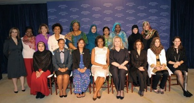Date: 03/08/2012 Description: Group photo: International Women of Courage awardees, Secretary Clinton, First Lady Michelle Obama (center, front row) - State Dept Image