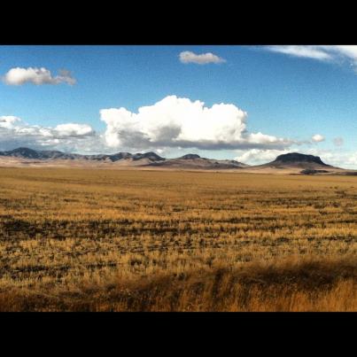 Photo: A beautiful view of the Highwood mountains and round butte, outside of Stanford, Montana.