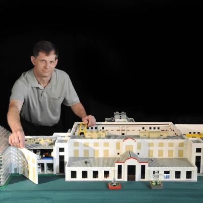 Photo: A LEGO model of the Navy's Laboratory for Autonomous Systems Research, part of the U.S. Naval Research Laboratory. The LEGO artist is William Adams, who works by day in the Navy Center for Applied Research in Artificial Intelligence. Some of the robots that he manages are featured in his model, which he built after work hours using 13,400 LEGO pieces.

Photo by Jamie Hartman for the U.S. Naval Research Laboratory. View more photos of the LEGO model at http://go.usa.gov/YWfA