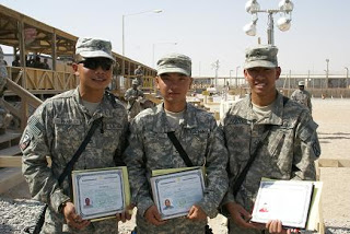 Three newly naturalized soldiers