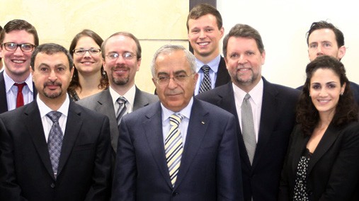 Members of the U.S. delegation to the Partners for a New Beginning Celebration of Innovation Conference pose for a photograph with Palestinian Authority Prime Minister Salam Fayyad in Ramallah, October 7, 2012. [State Department photo/ Public Domain]