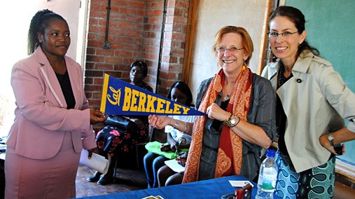 Lin Larson, center, of UC Berkeley, the Deputy School Director at Zengeza High School, and U.S. Embassy Harare Public Affairs Officer Sharon Hudson Dean discuss a scholarship program in Chitungwiza, Zimbabwe, September 27, 2012. [State Department photo/ Public Domain]