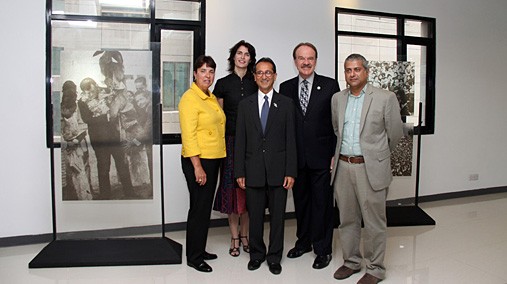 Dawn McCall joins Ambassador Dan W. Mozena, Public Affairs Officer Lauren Lovelace, Akku Chowdhury, and M.K. Aaref at the entrance of the new Edward M. Kennedy Center for Public Service and the Arts in Dhaka, Bangladesh, July 14, 2012. [State Department photo/ Public Domain]