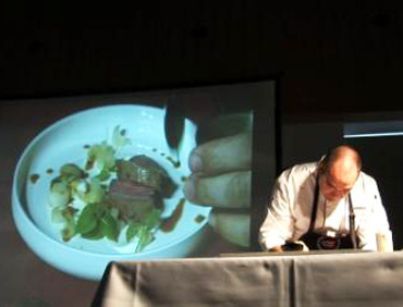 Dutch Chef Eric Troost prepares an upscale dish using U.S. beef during a cooking demonstration for about 130 Belgian chefs Sept. 24. The demo was part of the first U.S. beef tasting event held in Belgium, which was hosted by the Foreign Agricultural Service (FAS) office in The Hague, Netherlands, and the U.S. Meat Export Federation (USMEF). The tasting was part of ongoing efforts to help expand U.S. beef exports to the European Union (EU). (Photo courtesy FAS The Hague) 
