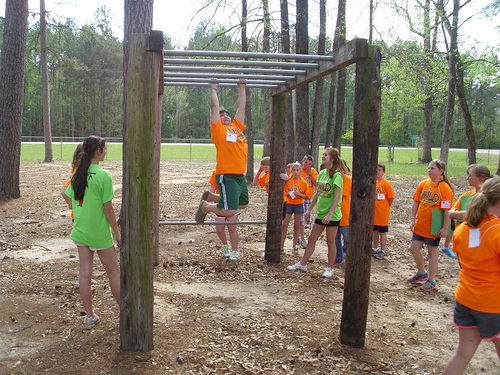 4-H campers enjoy incorporating fitness into a healthy lifestyle.  Here, participants work to complete an obstacle course.