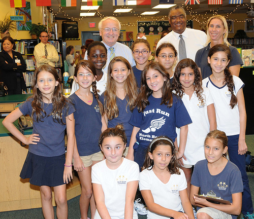 FNCS Under Secretary Kevin Concannon and FNS SERO Regional Administrator Don Arnette meet the Student Wellness Team from North Beach Elementary School, Miami Beach, Fla., during a recent visit to the school. (USDA photo by Debbie Smoot).