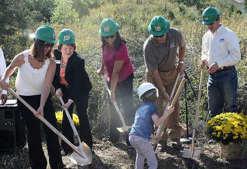 U.S. Department of Agriculture’s (USDA) Rural Development (RD) Business and Cooperative Programs Administrator Judith Canales (black suit) assists at the groundbreaking of the Riverhouse Children’s Center in Durango, CO on Thursday, Aug. 30, 2012. USDA RD provided $1.6 million in Community Facility loan funding for the project.  USDA photo by Amy Mund.