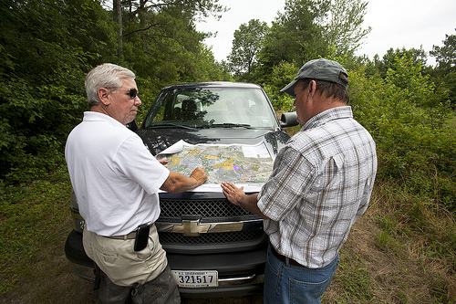 District Conservationist Nelson Brice and Kirby Wells discuss restoration plans for the 1,700 acre easement.