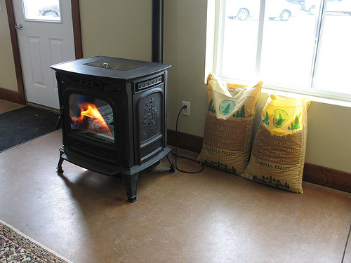 Isabella Pellets at work:  A wood stove burns brightly with plenty of pellets