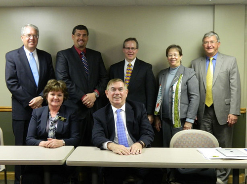 Front row: Mary Honke, Vice President for Institutional Advancement and Dr. Greg Smith, President of Central Community College. Back row from left to right are:  Dr. Jack Huck, President of Southeast Community College; Ryan Purdy, Interim President of Mid-Plains Community College; Dr. Todd Holcomb, President of Western Community College; State Director Maxine Moul; and Dennis Baack, Executive Director of the Nebraska Community College Association.