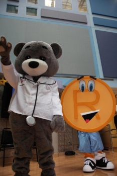 Dr. Bear ® and T.Markey, the USPTO's trademark mascot, at 2011 visit to Children's National Medical Center.  Photo by Roberto Ortiz.