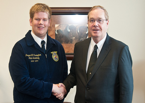 Jasper Cunningham, Michigan FFA National Officer candidate, Junior at Michigan State University, and owner of the Seed Boy Seed Company (left) meets with Agriculture Under Secretary for Rural Development Dallas Tonsager at the Agriculture Department.