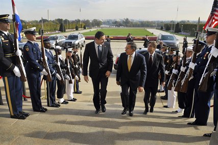 U.S. Defense Secretary Leon E. Panetta, right, escorts Croatian Defense Minister Ante Kotromanovic, left, through an honor cordon into the Pentagon, Oct. 17, 2012. 