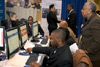 At CBP’s recent job fair, applicants use computers to apply for open positions.