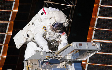 NASA astronaut Andrew Feustel, STS-134 mission specialist, installs the Materials on International Space Station Experiment – 8, or MISSE-8, hardware. MISSE-8 is a test bed for materials and computing elements attached to the outside of the International Space Station.