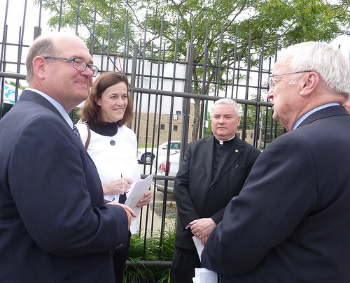 Under Secretary Concannon speaks with members of the Chicago Summer Food Work Group. From left: Mark Haller (ISBE), Diane Doherty (IHC), Monsignor Michael Boland (Archdiocese of Chicago), Under Secretary Kevin Concannon (USDA).