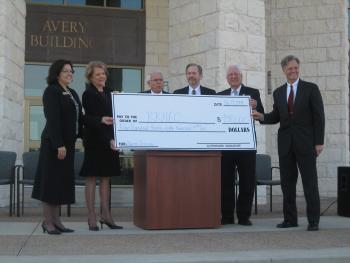 Carter presents check to Texas State in River Round