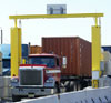A truck passes through one of the radiation portals unveiled today by Robert C. Bonner, Commissioner of Customs and Border Protection, at the port of Newark NJ.