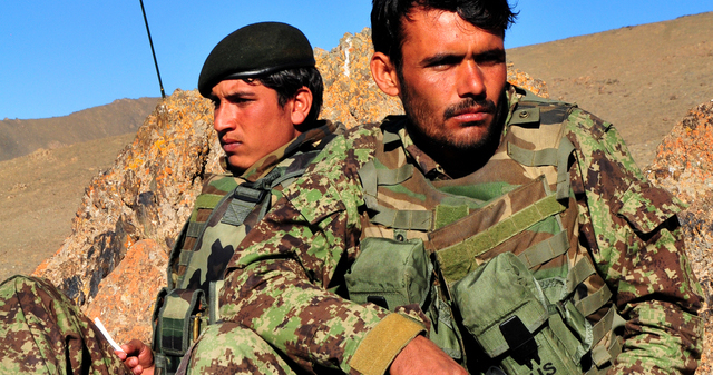 Afghan soldiers from 4th Toli, 2nd Kandak of the Afghan National Army overwatch the Kona Kumar valley in Afghanistan's Wardak province, Oct. 4. The Afghan soldiers were providing security in assistance of an operation to clear the valley of suspected insurgents. (Photo by Sgt. Michael Sword)