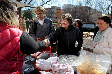 Agriculture Deputy Secretary Dr. Kathleen Merrigan meets with local producers at the North Carolina University's student run Farmer's Market in Raleigh, NC, on Feb. 9, 2011.