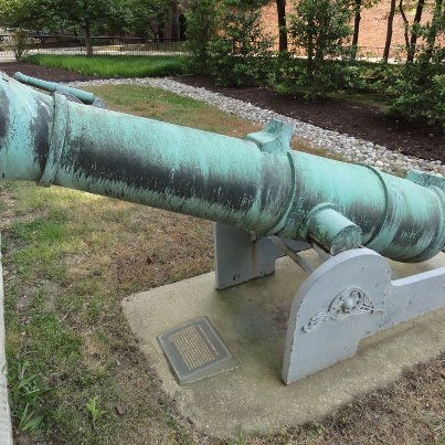 Photo: Japanese 30-pounder bronze gun located near the Navy Department Library. This gun was part of the armament of the batteries guarding the Shimonoseki Straits, bombarded and silenced on 5-6 September 1864, by an allied naval squadron which included the chartered American armed steamer Ta Kiang. This operation is credited with ending a growing anti-foreign movement in western Japan. The prominent bases for front and rear sights, of particular importance for long range seacoast gunnery, are unusual. Photo courtesy of Glenn E. Helm.
