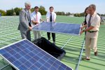 Energy from new photovoltaic panels atop warehouses at U.S. Army Garrison...