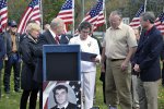 Staff Sgt. Derek Farley began greeting visitors as they entered and left the small...