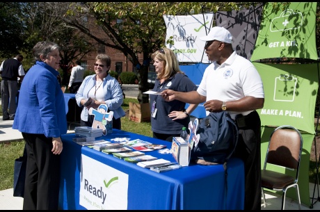 Secretary Napolitano learns about preparedness measures for federal employees in the Nation Capital Region during a National Preparedness Month Outreach Event at DHS Headquarters