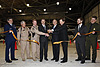 Key officials participate in a ribbon cutting for the Unmanned Aircraft Operations Center operations center in Grand Forks, N.D.