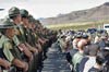 Border Patrol agents and audience view ceremony.