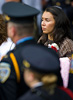 Ericia Aguilar, wife of deceased Border Patrol Senior Agent Luis Aguilar, who was killed in the line of duty, observes the National Peace Officers' Memorial Service held in Washington, D.C.