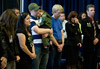 Family members of CBP officers and agents killed in the line of duty attend a memorial service held at the Ronald Reagan building in Washington, D.C.