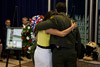 CBP Border Patrol Chief David V. Aguilar comforts a family member of a CBP Border Patrol agent killed in the line of duty.
