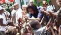 Michelle Obama greeting children in Port-Au-Prince (White House)