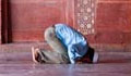 Muslim man praying (Courtesy Derek Brown)