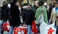 Crowd of shoppers crossing the street (AP Images)