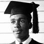 Close-up of Ernest Green wearing mortarboard for graduation (AP Images)