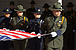 Members of the Customs and Border Protection Honor Guard carry a ceremonial flag in Washington D.C. at a memorial service honoring fallen agents and officers.
