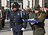 Members of the Customs and Border Protection Honor Guard carry a folded ceremonial flag in Washington D.C. at a memorial service honoring fallen officers and agents.