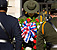 A Border Patrol agent who is a member of the Customs and Border Protection Honor Guard lays a wreath in Washington D.C. at a memorial service honoring fallen officers and agents of CBP.