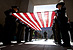 Members of the Customs and Border Protection Honor Guard hold a ceremonial flag in Washington D.C. at a memorial service honoring fallen officers and agents.