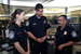 CBP Officers discuss strategies before air passengers arrive.