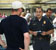 A CBP officer discusses a passenger's documents after arrival at Washington-Dulles International Airport.