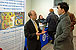 A CBP chief counsel employee at Chicago's National Career Day event engages with an event visitor.