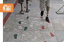 children learning to walk with prosthetics